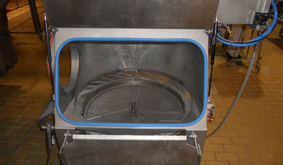 Sifting and conveying ingredients in a mixer 
