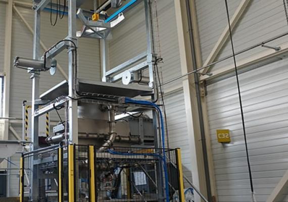 Emptying of big bags and bags for container filling
