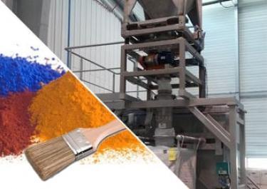 Discharge of paint powder containers into big bag