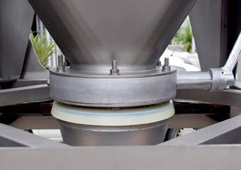 Butterfly valve on storage container - Bulk material and powder handling