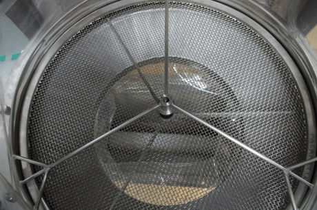 sack dumping station with sieve